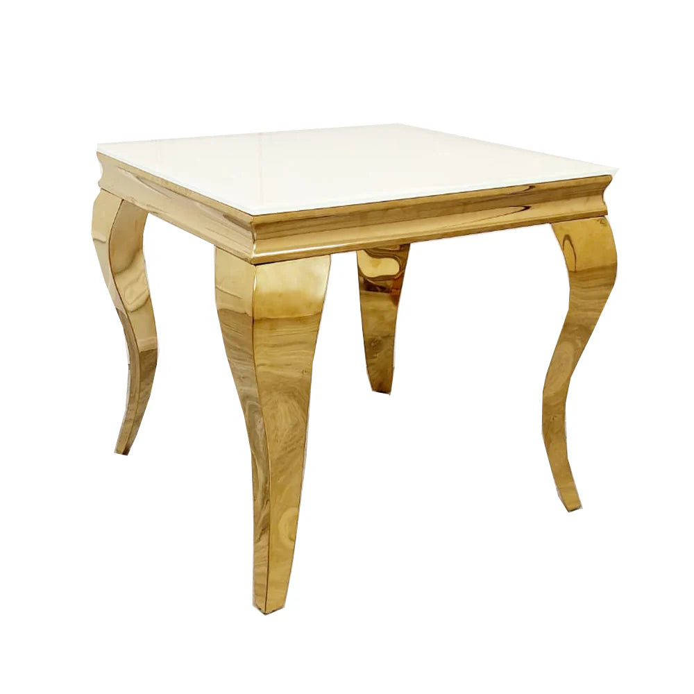 The Louis Gold Lamp Table features a glossy white top and four curved, reflective gold legs, making it a sophisticated marble side or lamp table that enhances any minimalist décor.