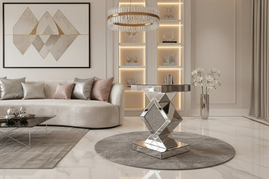 The Diamond Luxe Mirrored Side Table features a modern glam geometric design with a diamond-shaped centerpiece filled with crushed crystals and mirrored surfaces on every side.